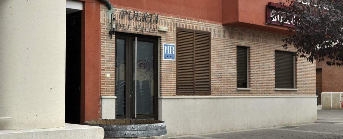 Hostal Puerta Del Valle La Cisterniga ภายนอก รูปภาพ